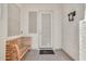Cozy front porch with a welcoming bench and decorative front door at 3044 E Sparrow Pl, Chandler, AZ 85286