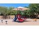 Fun playground area with colorful equipment and ample shade, perfect for children to play and explore at 3044 E Sparrow Pl, Chandler, AZ 85286