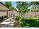 Spacious backyard with a hammock, a seating area, a grill, and a lush green lawn at 3115 N 34Th Pl, Phoenix, AZ 85018