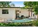 Backyard with a hammock, covered patio, string lights, and comfortable seating perfect for outdoor entertaining at 3115 N 34Th Pl, Phoenix, AZ 85018