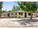 Charming single-story home with a well-maintained front yard and a carport at 3115 N 34Th Pl, Phoenix, AZ 85018