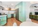 Inviting eat-in kitchen features stainless steel appliances and light green cabinets at 3115 N 34Th Pl, Phoenix, AZ 85018