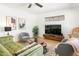 Bright living room featuring modern furniture, stylish decor, and wood-look floors at 3115 N 34Th Pl, Phoenix, AZ 85018