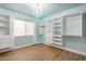 Bedroom with walk-in closet and natural light at 317 E Belmont Ave, Phoenix, AZ 85020