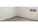 Bedroom with neutral carpeting and a window for natural light and a view at 35815 N King Ln, San Tan Valley, AZ 85140