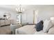 Inviting bedroom with a luxurious bed, comfortable seating, and ample natural light at 35815 N King Ln, San Tan Valley, AZ 85140