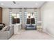 The bonus room has plush carpeting, two large windows, and neutral decor at 3648 E Fargo St, Mesa, AZ 85205