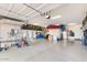 Oversized garage equipped with lots of storage and room for multiple vehicles and bikes at 3648 E Fargo St, Mesa, AZ 85205
