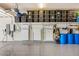 Spacious garage with Tesla power wall, tons of storage, and epoxy flooring at 3648 E Fargo St, Mesa, AZ 85205