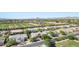 Scenic aerial view of a well-maintained neighborhood with mountain views in the background at 3648 E Fargo St, Mesa, AZ 85205