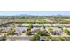 Aerial view showcasing a well planned neighborhood with tidy landscaping and mature trees at 3648 E Fargo St, Mesa, AZ 85205