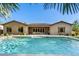 The backyard showcases a sparkling pool, surrounded by a spacious patio and desert landscaping at 3648 E Fargo St, Mesa, AZ 85205
