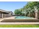 Inviting pool offers a serene escape with ample patio space, desert plants, and lush landscaping at 3648 E Fargo St, Mesa, AZ 85205