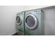 Modern washer and dryer set in a dedicated laundry area at 38086 W Isabella Ln, Maricopa, AZ 85138