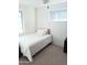 Bright bedroom featuring neutral walls, carpet and ample natural light from two windows at 3942 N 38Th St, Phoenix, AZ 85018