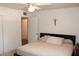 Bedroom featuring ceiling fan, closet and adjacent doorway at 3942 N 38Th St, Phoenix, AZ 85018