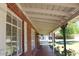 Inviting covered porch with charming posts and a view of the landscaped front yard at 3942 N 38Th St, Phoenix, AZ 85018