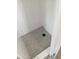Modern shower with hexagonal tile floor and sleek subway tile walls at 3942 N 38Th St, Phoenix, AZ 85018