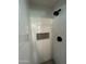Updated shower with black hardware, niche, and white subway tile at 3942 N 38Th St, Phoenix, AZ 85018