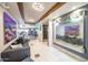 Stylish lobby featuring a water feature, modern decor, comfortable seating, and an open view of the fitness center at 4050 N Terra Mesa Cir, Mesa, AZ 85207
