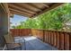 Balcony with chairs overlooking lush greenery at 4062 W Cielo Grande --, Glendale, AZ 85310