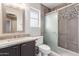 Modern bathroom featuring a sliding glass shower door, vanity, and updated fixtures at 4062 W Cielo Grande --, Glendale, AZ 85310