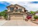 Charming two-story home with desert landscaping and a spacious two car garage at 4062 W Cielo Grande --, Glendale, AZ 85310