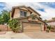 Charming two-story home featuring desert landscaping and a two car garage at 4062 W Cielo Grande --, Glendale, AZ 85310