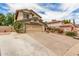 Charming two-story home featuring desert landscaping and a spacious two car garage at 4062 W Cielo Grande --, Glendale, AZ 85310