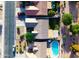 An aerial view of a cozy home with a well-kept backyard, surrounded by lush greenery and neighboring houses at 4110 E Brighton Way, San Tan Valley, AZ 85140