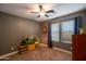 Spare bedroom featuring neutral carpet, ceiling fan, and natural light at 4110 E Brighton Way, San Tan Valley, AZ 85140