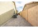 Wide side yard features easy to maintain tile and offers ample space for storage at 4110 E Brighton Way, San Tan Valley, AZ 85140