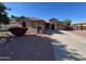 Charming single-story home with a well-maintained yard and a spacious driveway at 4130 E Megan St, Gilbert, AZ 85295