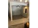 Open living space with tile and wood floors, neutral paint and a modern ceiling fan at 4130 E Megan St, Gilbert, AZ 85295