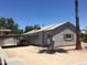 Quaint single-story home featuring a carport, stucco siding, and a well-kept front yard at 42 W Thomas Ln, Tempe, AZ 85281