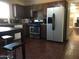 Functional kitchen featuring stainless steel appliances and ample cabinet space at 42 W Thomas Ln, Tempe, AZ 85281