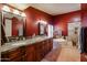 Luxurious bathroom with double vanities, soaking tub, and tiled walk-in shower at 4441 E Sunnyside Ln, Phoenix, AZ 85032