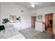 Well-lit bedroom offers a bed, desk, and sliding closet doors for storage at 4441 E Sunnyside Ln, Phoenix, AZ 85032
