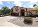 Charming two-story home featuring a terracotta roof and three-car garage at 4441 E Sunnyside Ln, Phoenix, AZ 85032