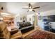 Bright living room with open layout and views into dining and kitchen areas at 4441 E Sunnyside Ln, Phoenix, AZ 85032