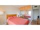 Comfortable bedroom with mirrored closet doors and a view of the city skyline at 4750 N Central Ave # D15, Phoenix, AZ 85012