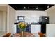 Stylish kitchen features white cabinets, black appliances, and a sleek countertop, perfect for cooking at 4750 N Central Ave # D15, Phoenix, AZ 85012