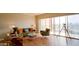 Bright living room with sleek hardwood floors, comfortable seating, and expansive city views at 4750 N Central Ave # D15, Phoenix, AZ 85012