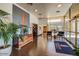 Well-lit lobby with modern decor, potted plants, and glass doors at 4750 N Central Ave # D15, Phoenix, AZ 85012