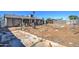 Expansive backyard with a partial patio offers potential for outdoor living and custom landscaping at 4870 W Almeria Rd, Phoenix, AZ 85035