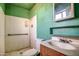 Bathroom featuring shower, toilet, vanity, and mirror at 4870 W Almeria Rd, Phoenix, AZ 85035