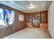 An empty bedroom featuring built-in shelving along one wall at 4870 W Almeria Rd, Phoenix, AZ 85035