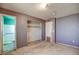 A standard bedroom next to a bathroom with closet at 4870 W Almeria Rd, Phoenix, AZ 85035