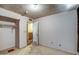 A bedroom featuring an open closet and doorway at 4870 W Almeria Rd, Phoenix, AZ 85035