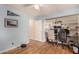 Bright bedroom features a spacious closet with built in shelving, hardwood floors, and blue walls at 4915 W Libby St, Glendale, AZ 85308